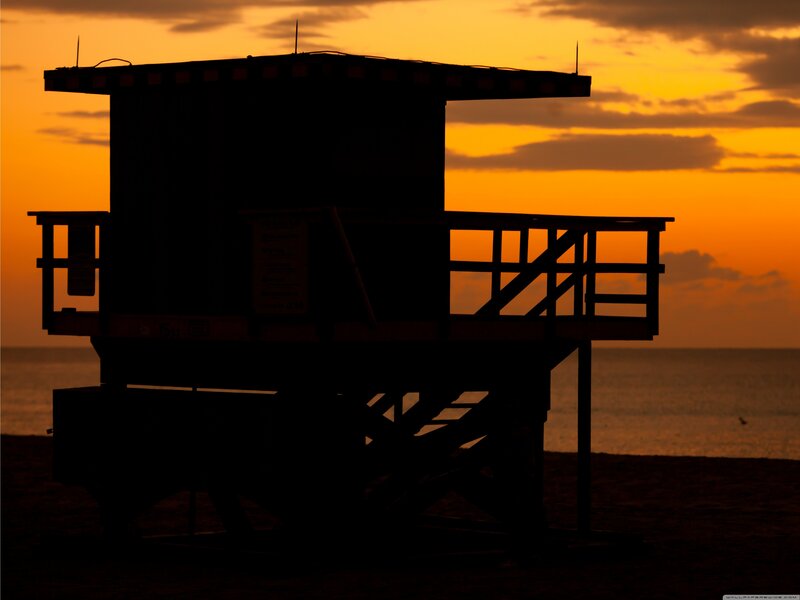 silhouette of lifeguard tower