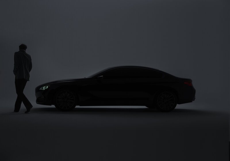 silhouette of man and car
