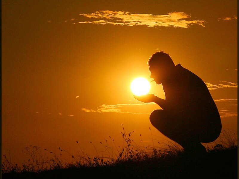 Silhouette of man at sunset