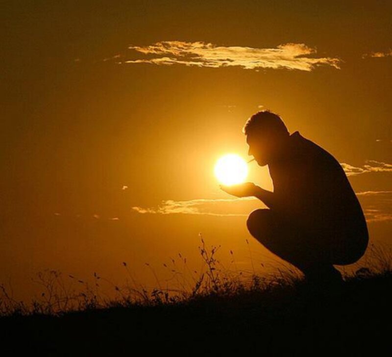Silhouette of Man Crouching
