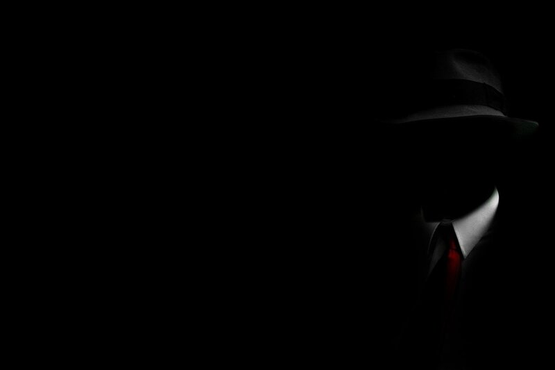 Silhouette of Man in Hat — Black, Dramatic