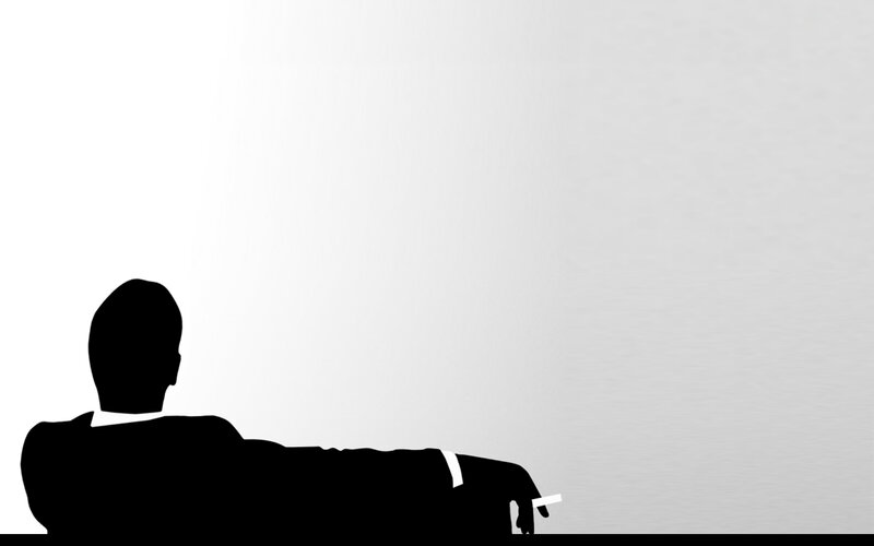silhouette of man sitting