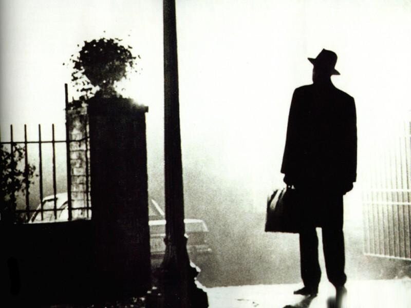 silhouette of man with briefcase