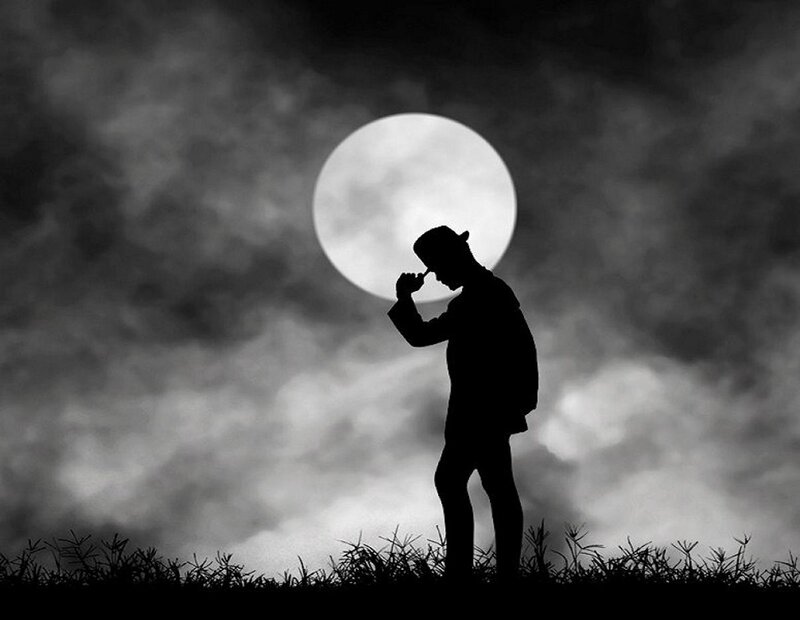 Silhouette of Man with Hat