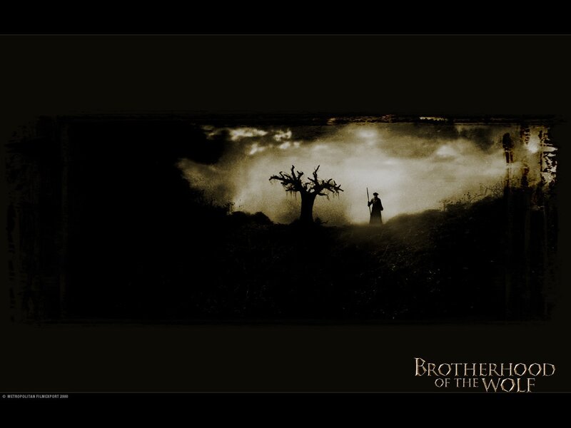Silhouette of Man with Staff