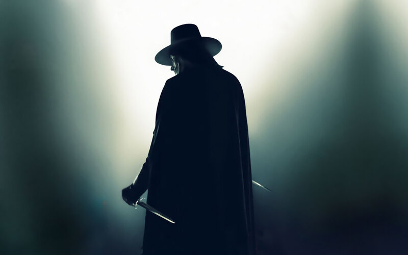 silhouette of masked figure