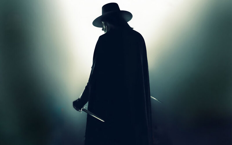 silhouette of masked figure