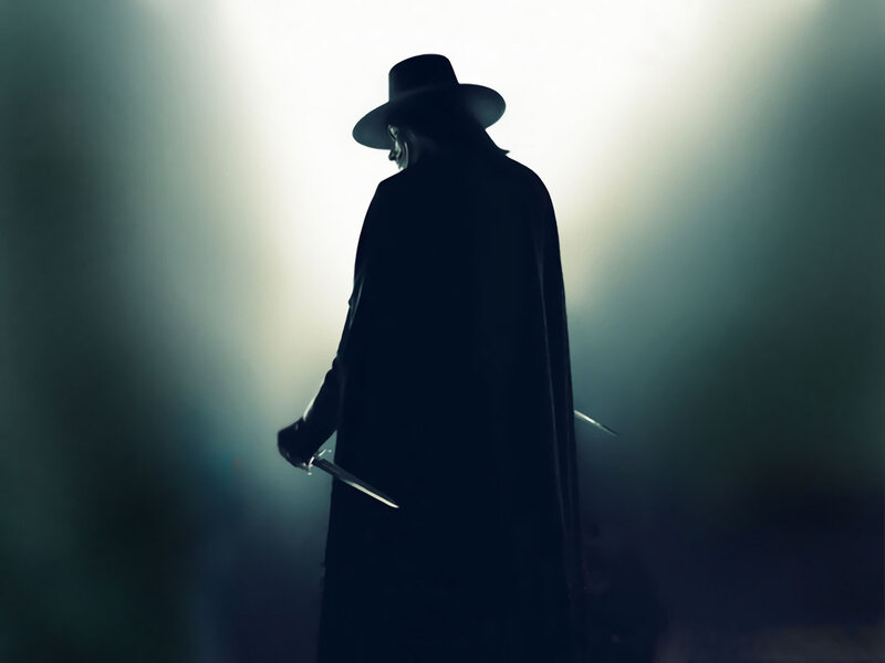 silhouette of masked figure with knife