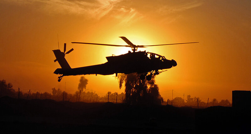 Silhouette of Military Helicopter — Orange, Dramatic, Sunset, Photograph