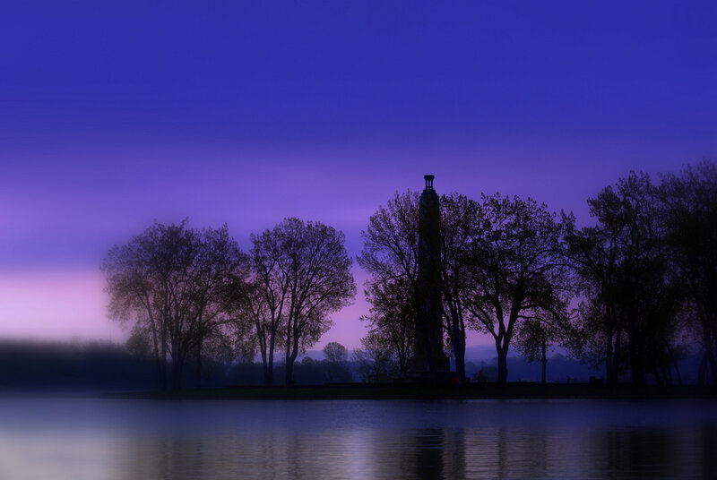 Silhouette of monument at dusk