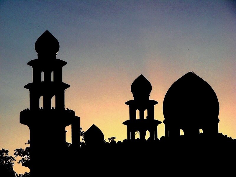 silhouette of mosque at sunset