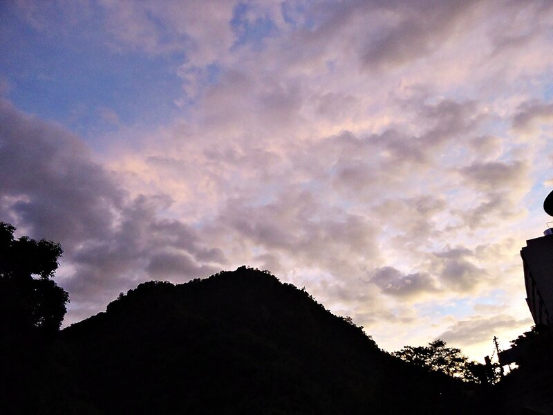 silhouette of mountain at dusk