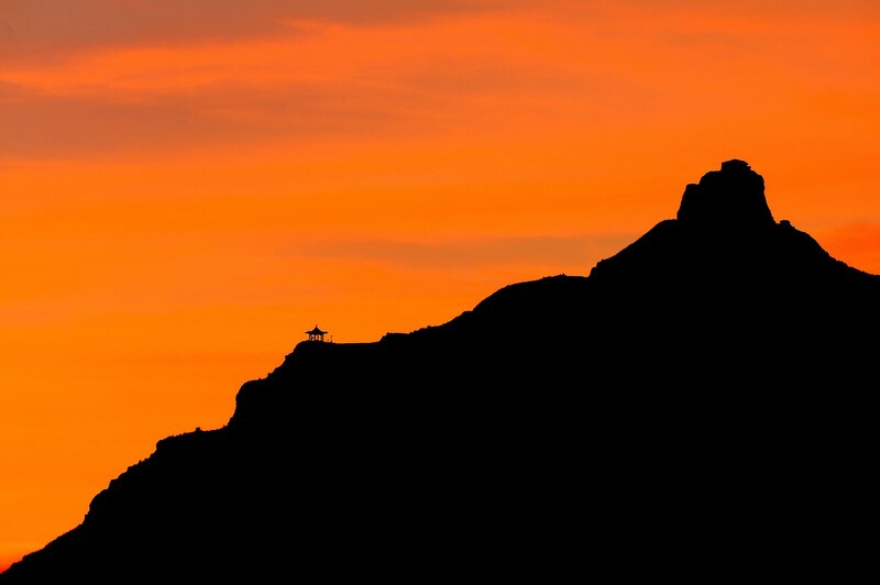 Silhouette of mountain at sunset