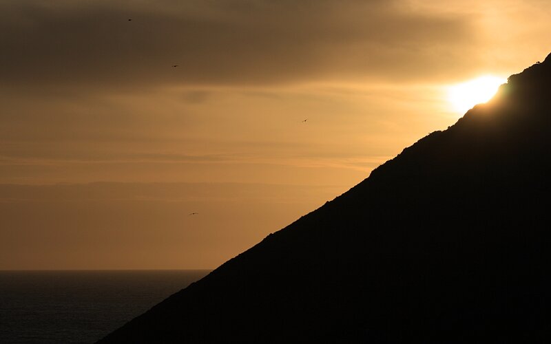 Silhouette of Mountain at Sunset — Orange
