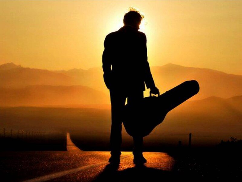Silhouette of Musician — Orange, Dramatic, Sunset