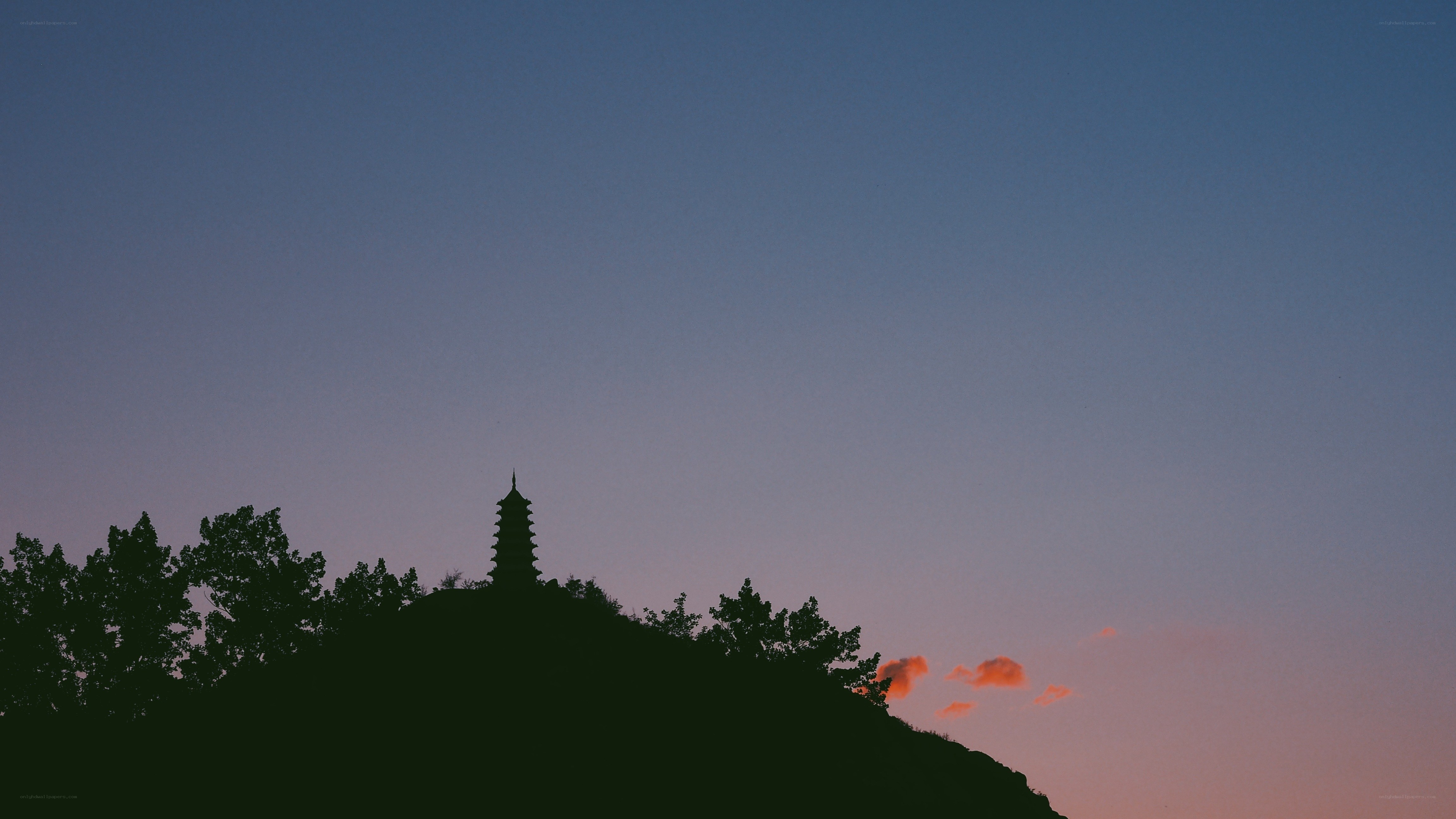 Silhouette of pagoda at dusk
