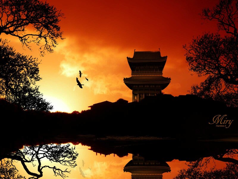 Silhouette of pagoda at sunset