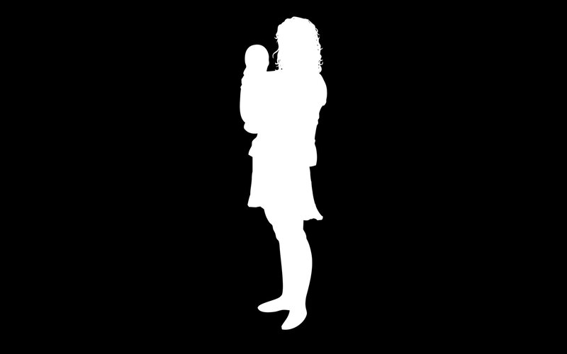 silhouette of parent holding child