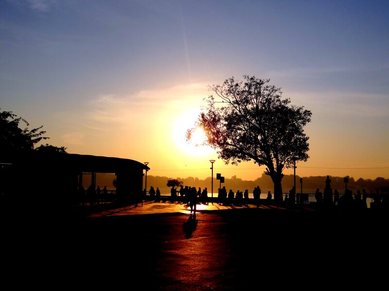 Silhouette of people at sunset
