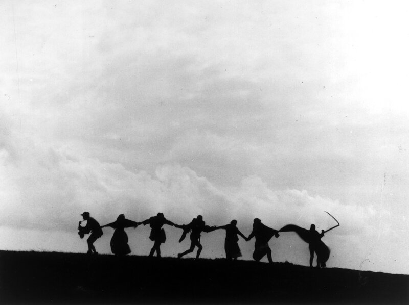 Silhouette of people holding hands