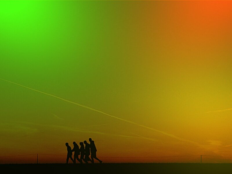 Silhouette of People Walking