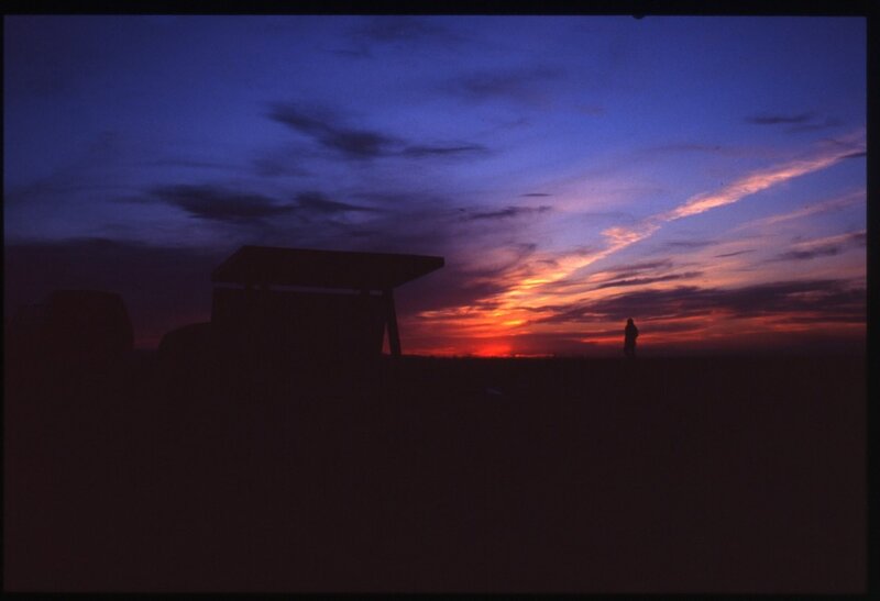 Silhouette of Person and Structure