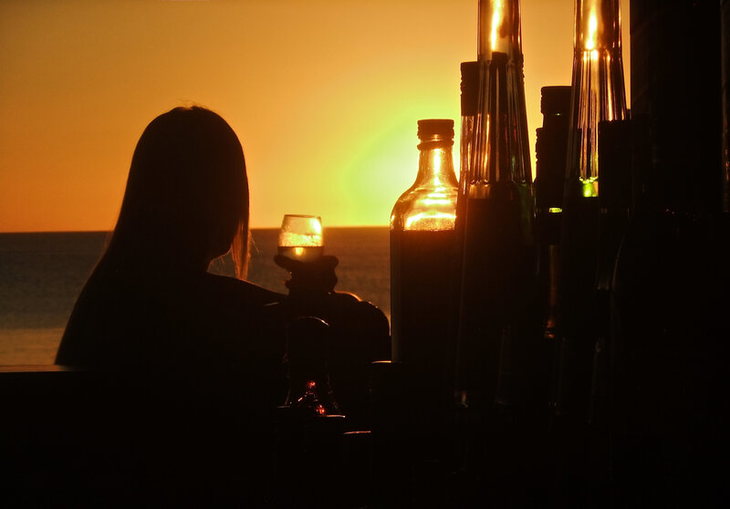 Silhouette of Person at Bar