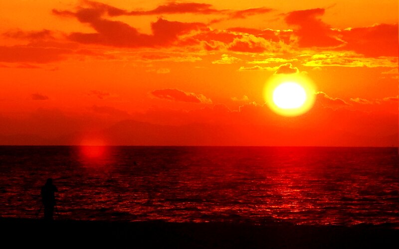 Silhouette of Person at Beach — Red