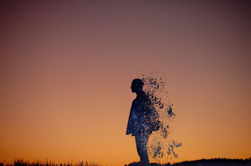 Silhouette of Person Dissolving