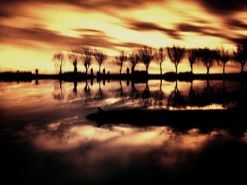 Silhouette of Person Fishing — Orange, Dramatic, Sunset