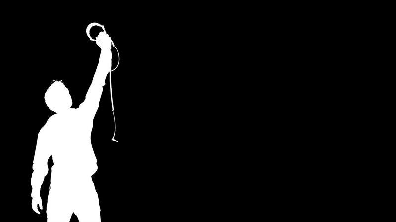 Silhouette of Person Holding Microphone