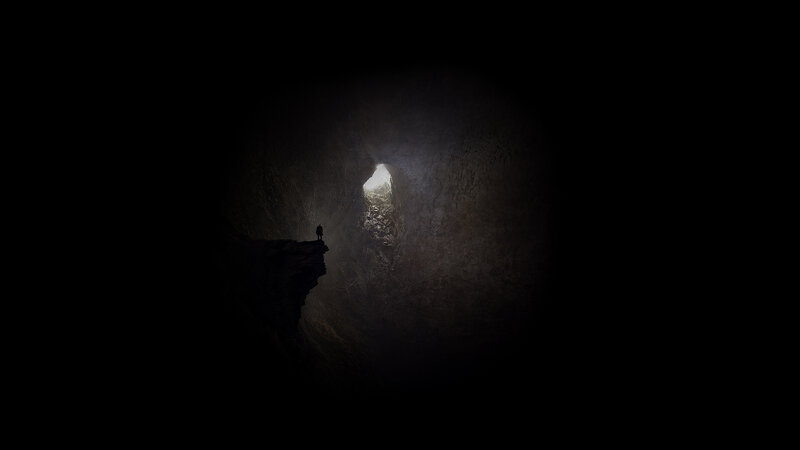 Silhouette of Person in Cave — Black, Dramatic