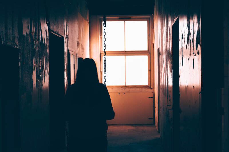 Silhouette of Person in Hallway — Black, Dramatic