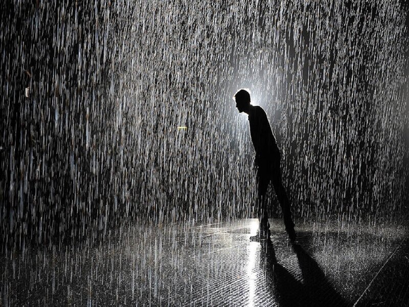 Silhouette of Person in Rain — Black, Dramatic