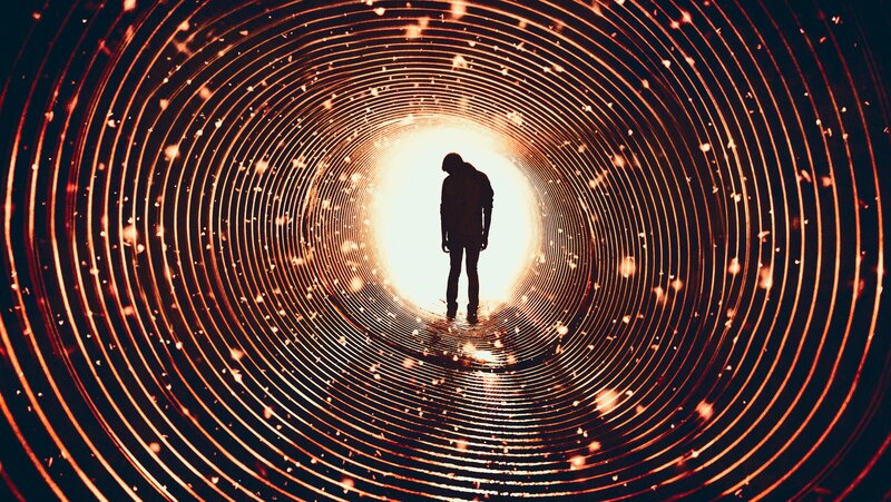 Silhouette of Person in Tunnel — Orange