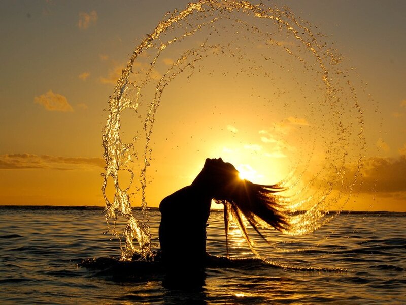 Silhouette of Person in Water — Gold, Dramatic, Sunset
