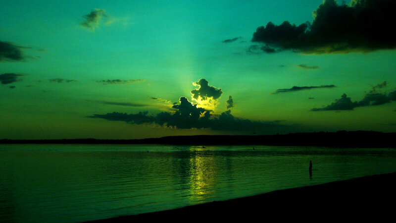 Silhouette of Person in Water — Green