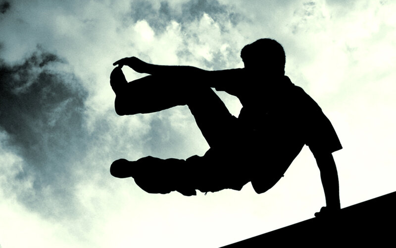silhouette of person jumping