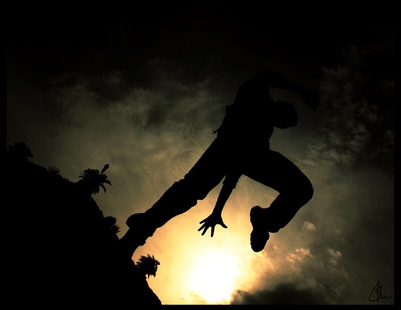 silhouette of person jumping