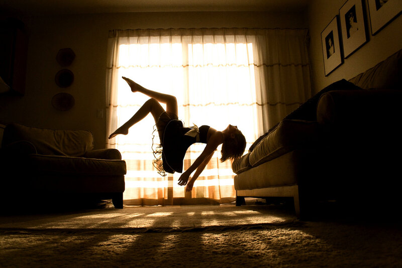Silhouette of Person Jumping — Brown, Dramatic