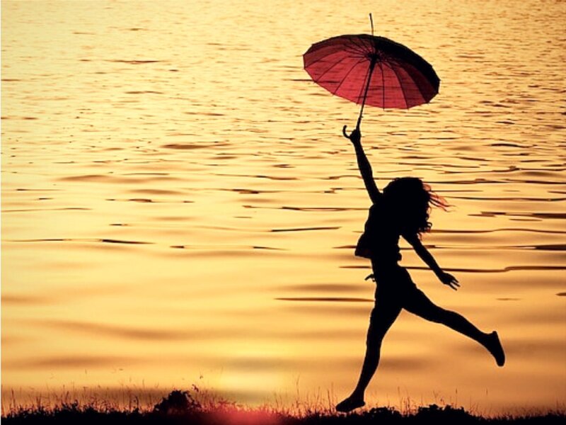 Silhouette of Person Jumping — Gold