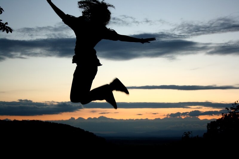 Silhouette of Person Jumping — Orange, Dramatic, Sunset, Photograph, Sky, Clouds