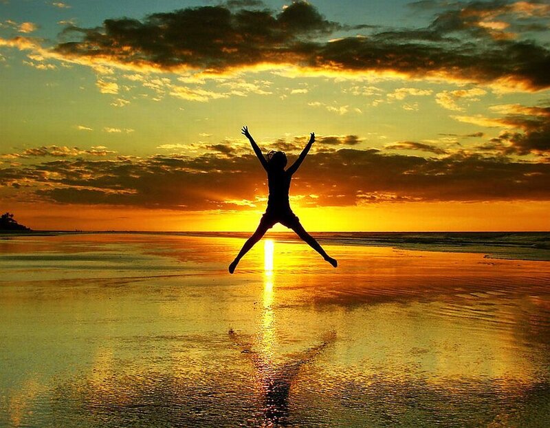 Silhouette of Person Jumping — Orange, Dramatic, Sunset, Photograph