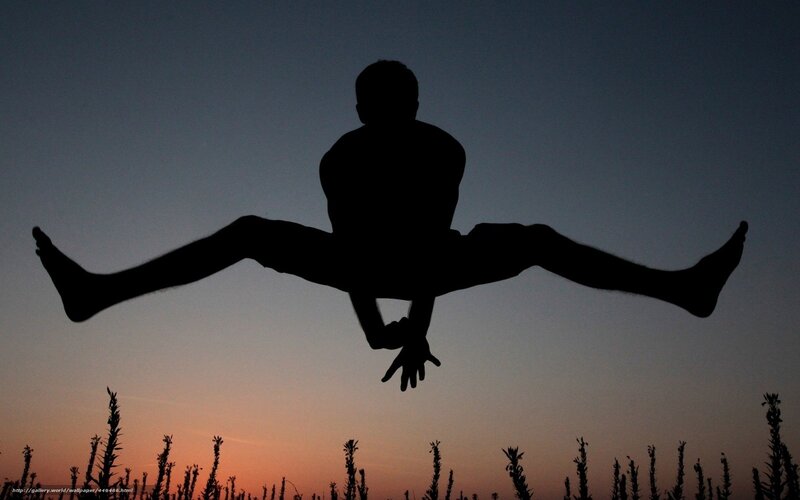silhouette of person jumping