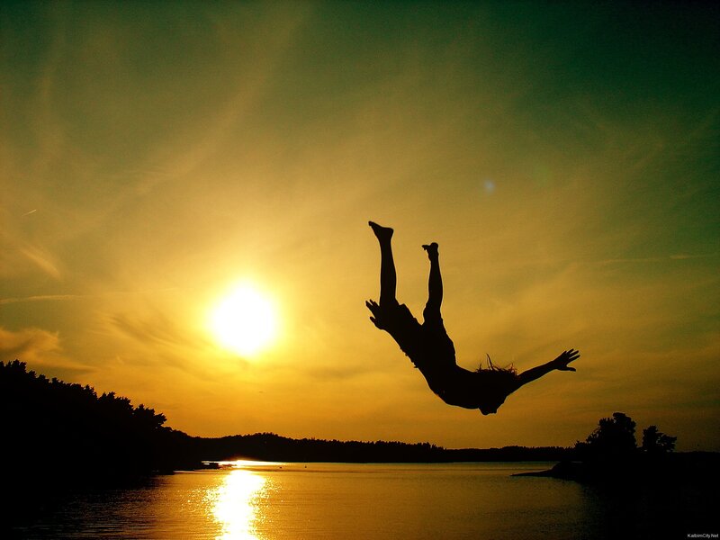 Silhouette of Person Jumping — Yellow, Dramatic