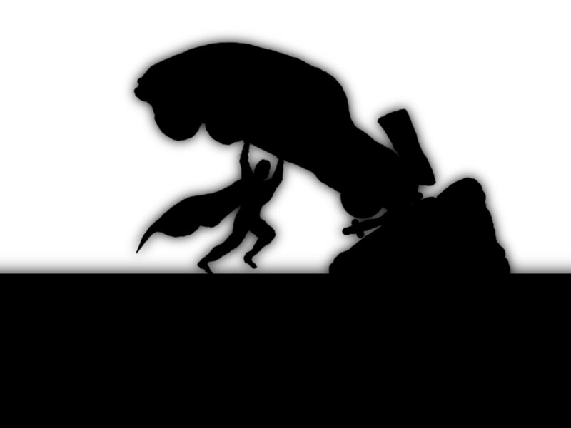 Silhouette of Person Lifting Rock