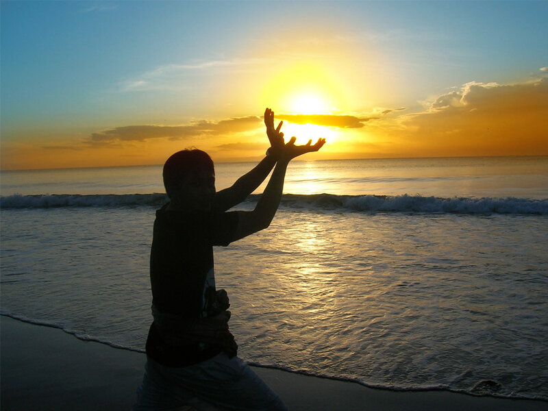 Silhouette of Person on Beach — Blue, Serene, Sunset, Photograph, Sun, Ocean, Waves