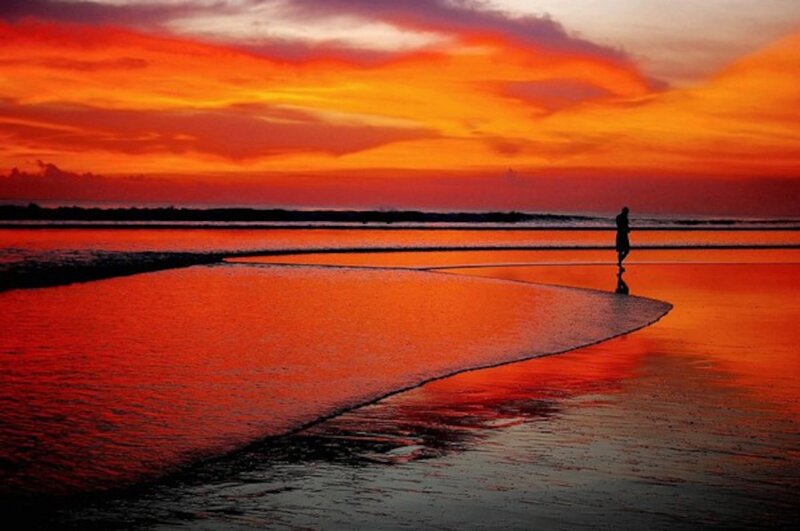 Silhouette of Person on Beach — Red, Dramatic, Sunset, Photograph