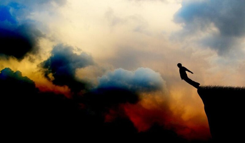Silhouette of Person on Cliff — Orange, Dramatic, Sunset, Digital Art, Clouds, Sky