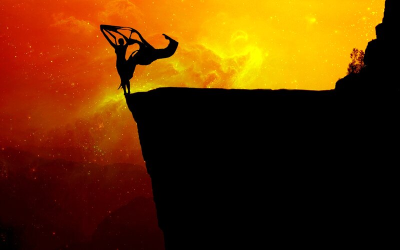 Silhouette of Person on Cliff — Orange, Dramatic, Sunset
